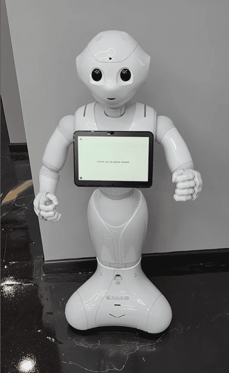dancing robot kiosk in Moja Life